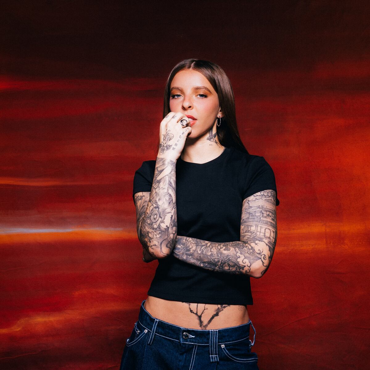 Young Miko arm tattoos