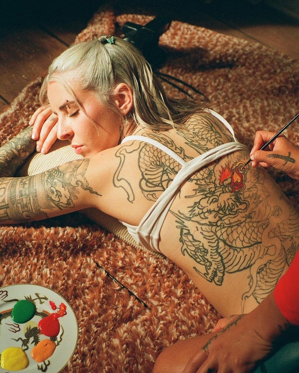 Young Miko dragon back tattoo process