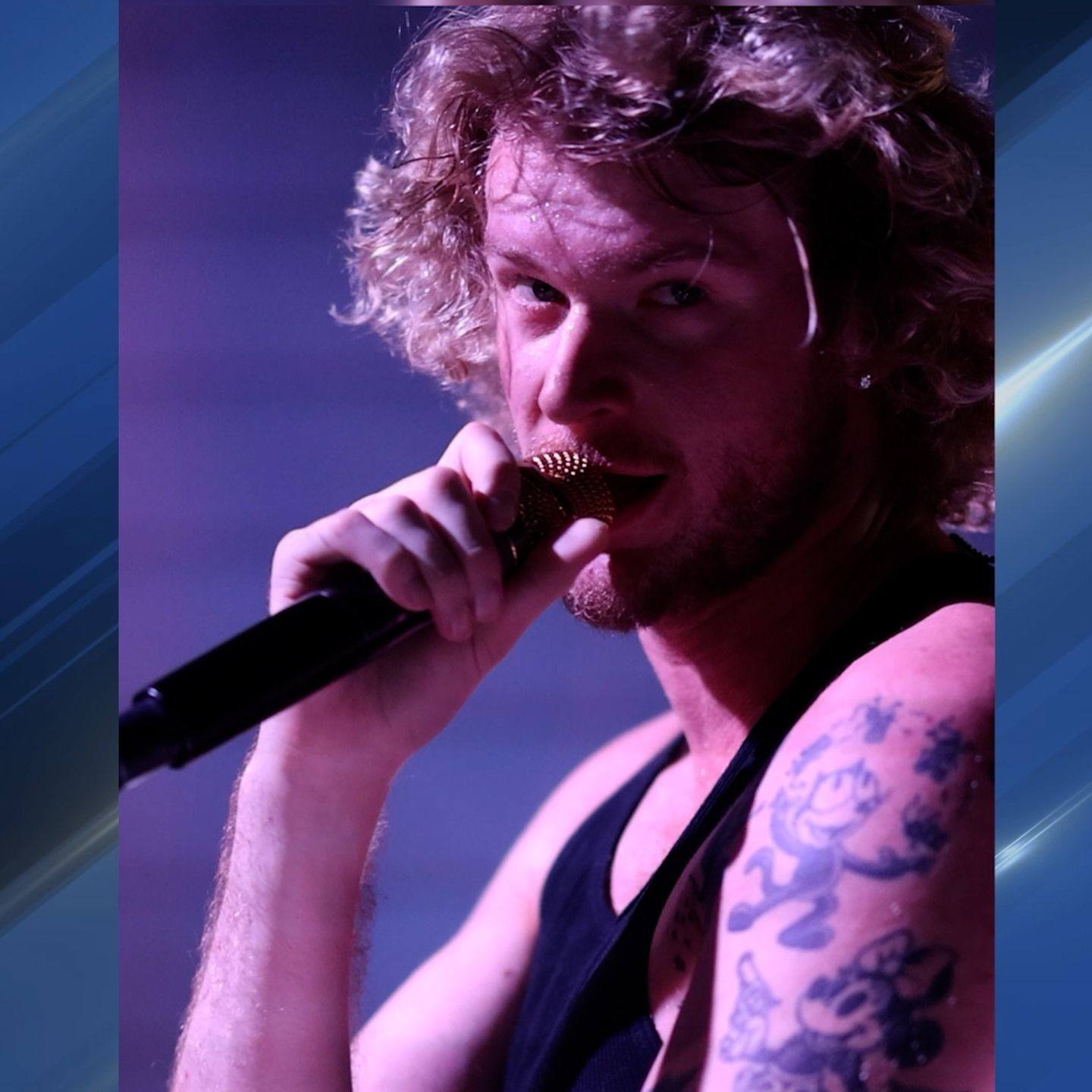 Yung Gravy cartoon tattoo on the arm during a live performance