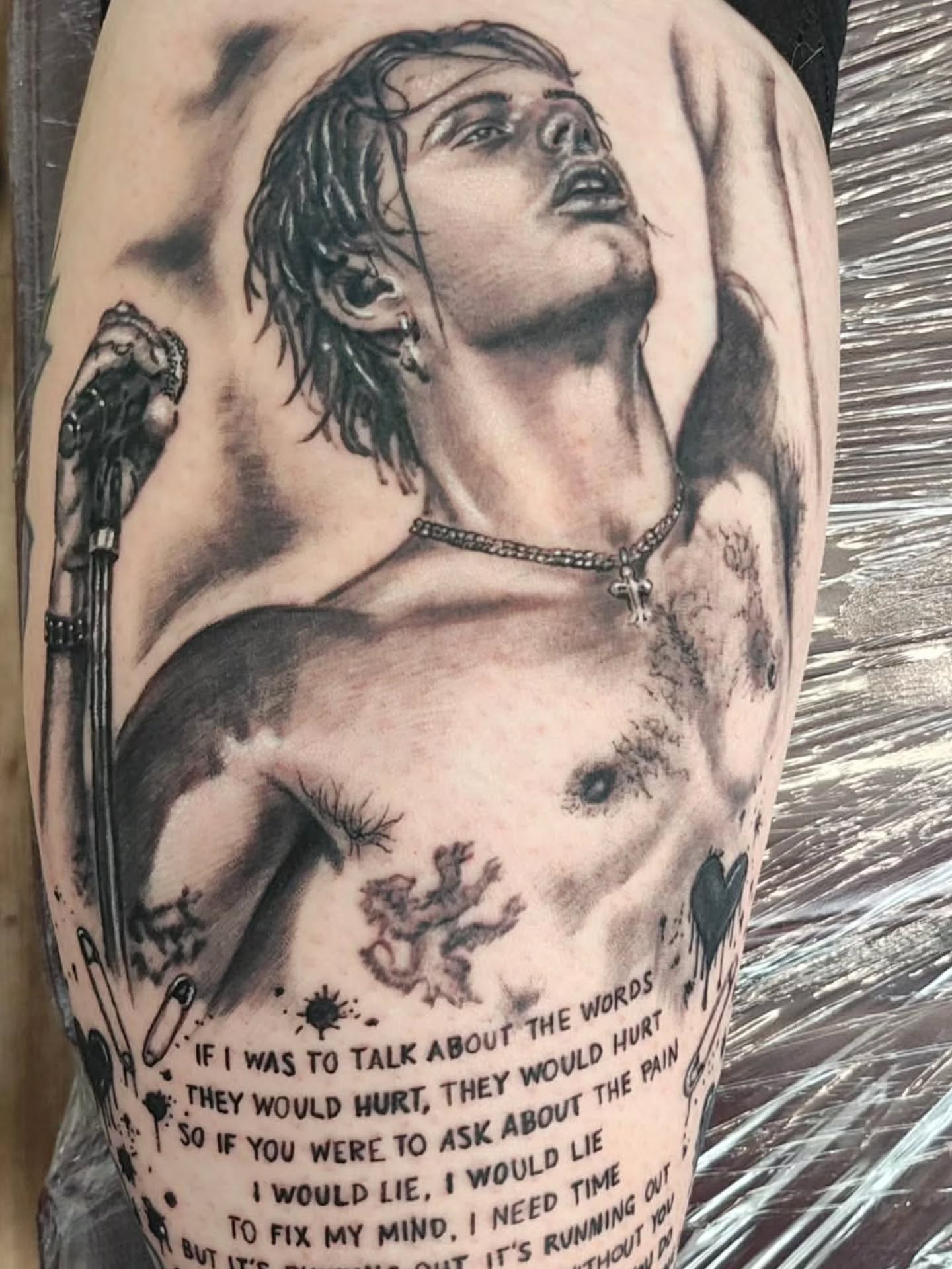 YUNGBLUD chest and heart tattoos
