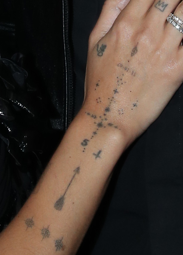 Zoë Kravitz hand and forearm tattoos