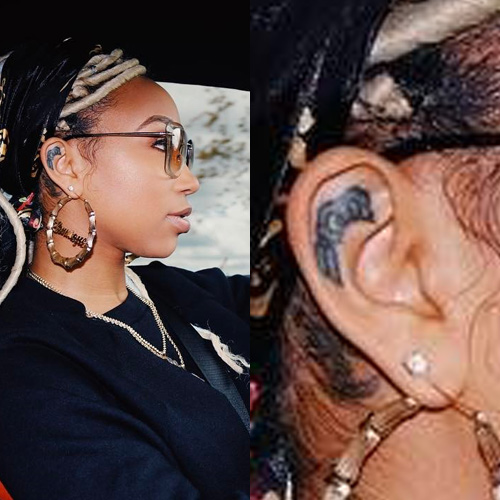 Zonnique Pullins symbol tattoo inside her ear