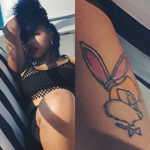 Zonnique Pullins Lola rabbit upper arm tattoo