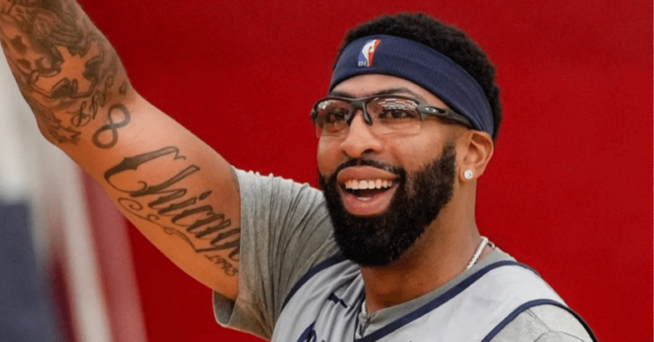 Anthony Davis tattoos: script and symbol placement