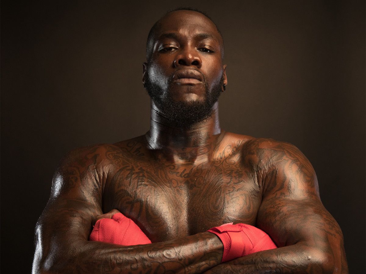 Deontay Wilder tattoos: shoulder and upper-arm tattoo coverage