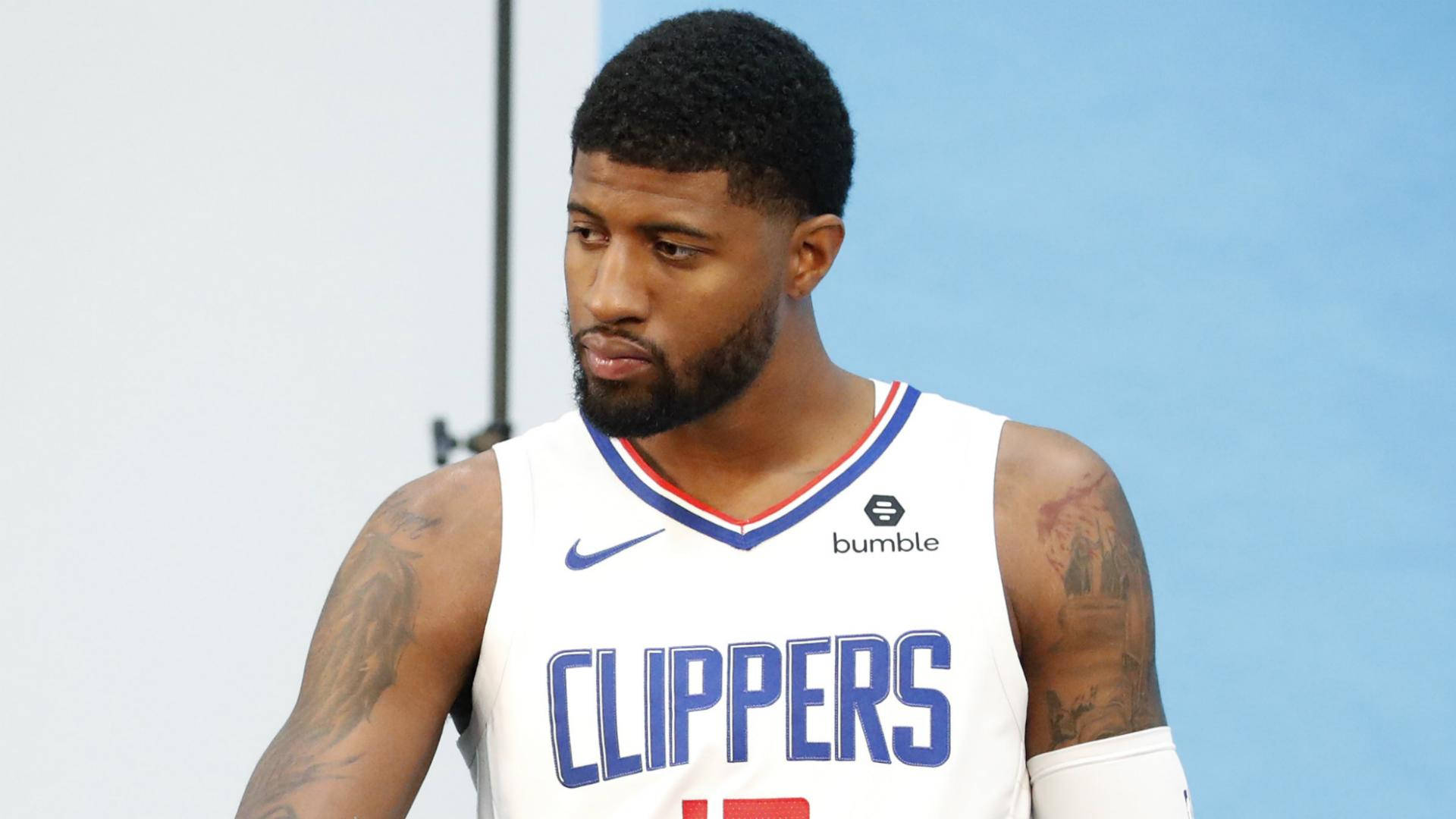Paul George tattoos: guardian angel shoulder tattoo