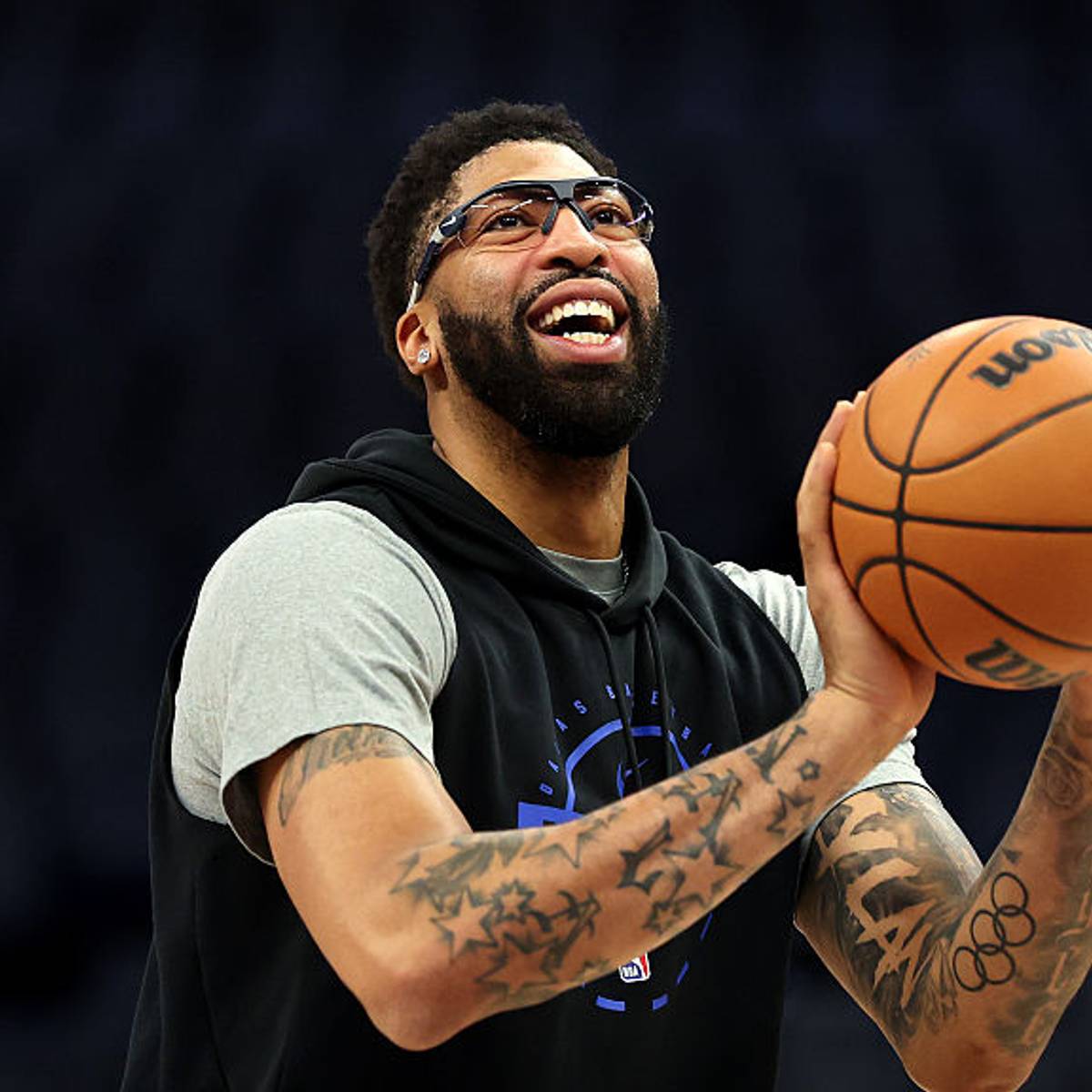 Anthony Davis tattoos: stars and Olympic rings