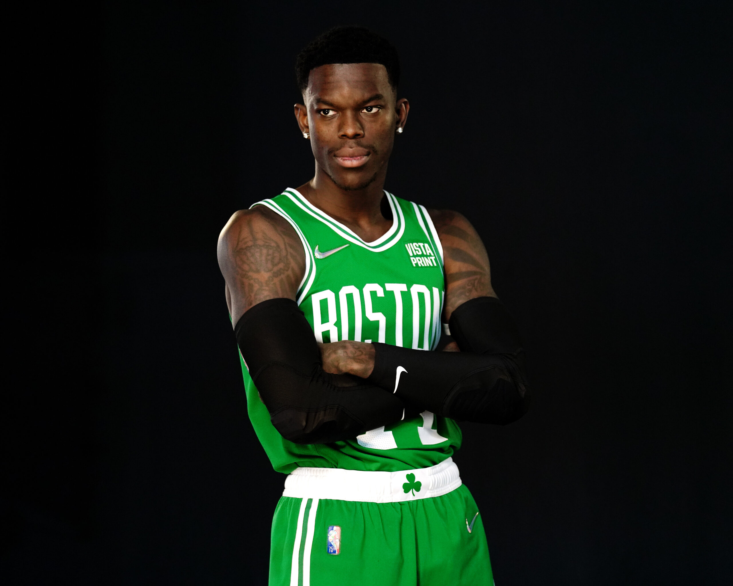 Dennis Schröder tattoos: family portrait and hand tattoo context