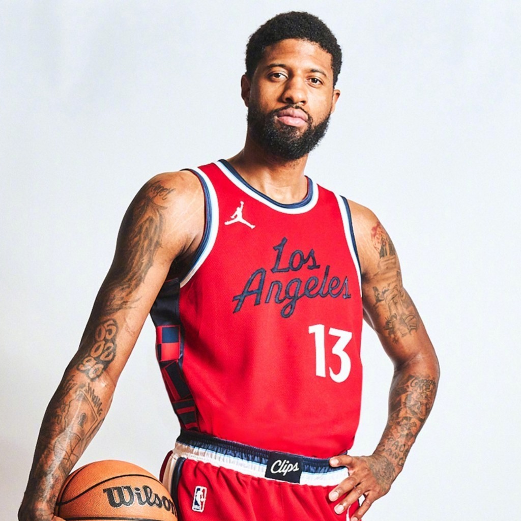 Paul George tattoos: Crown Me and chess lettering