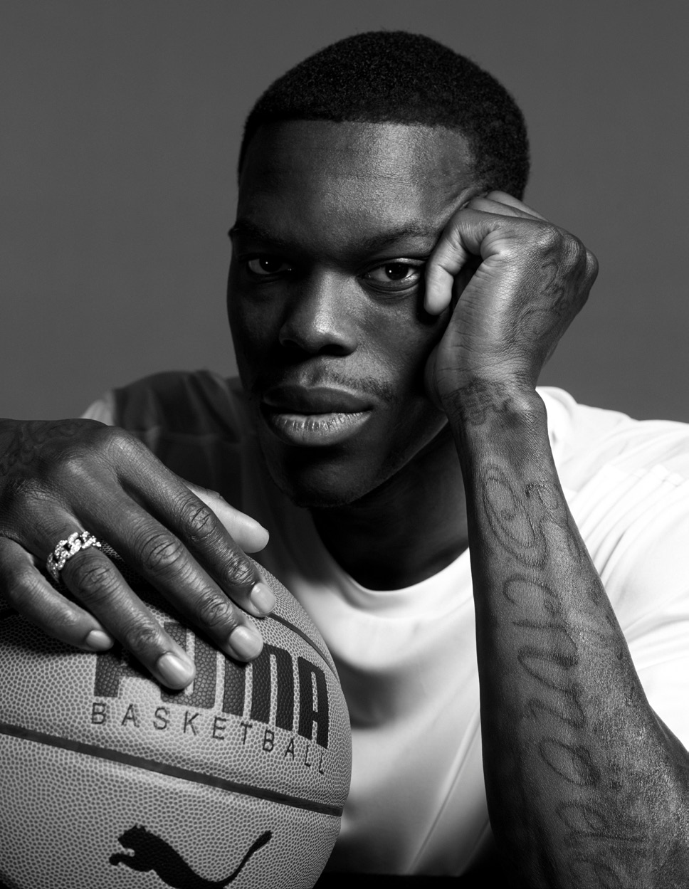 Dennis Schröder tattoos: chest, neck and shoulder connection