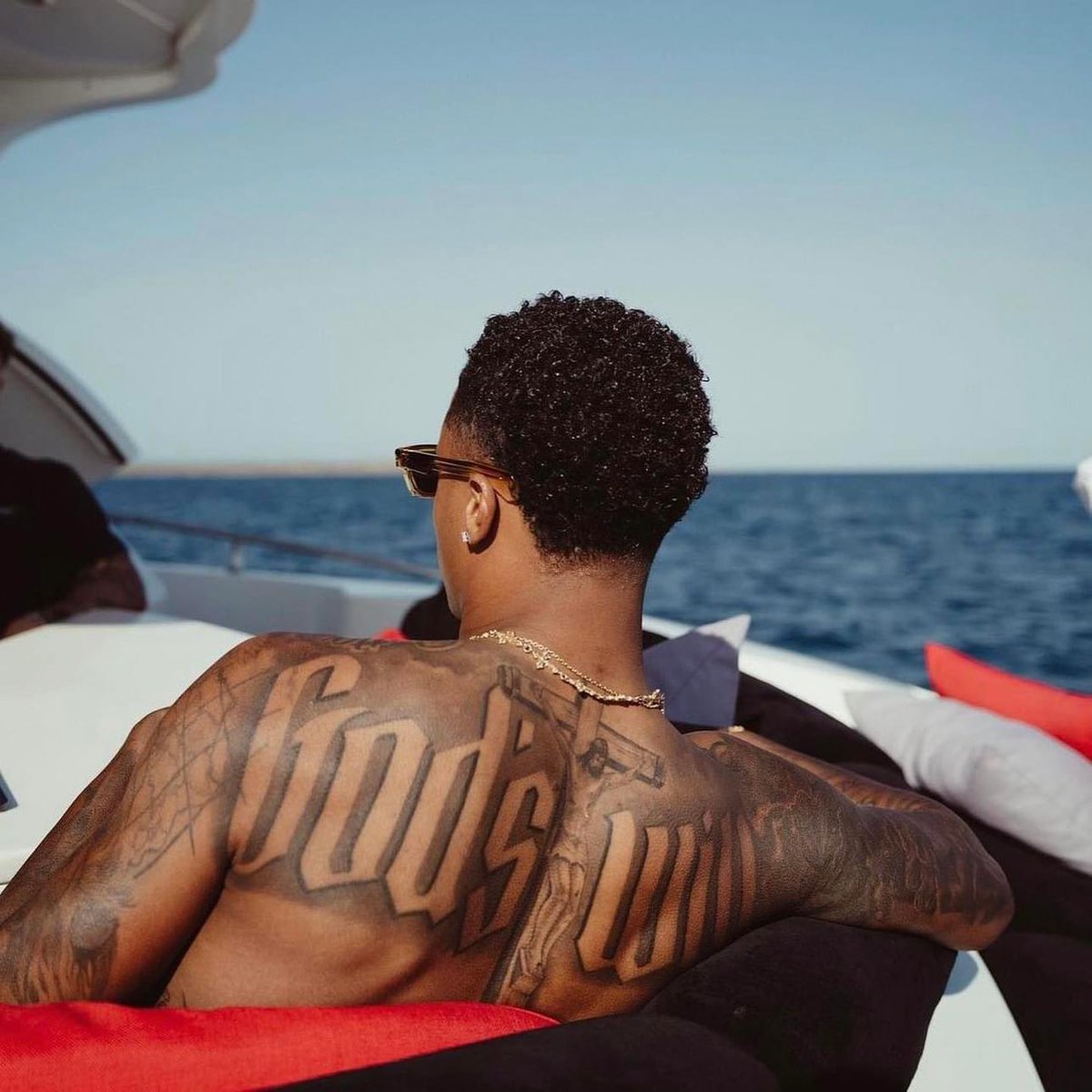 Paul George tattoos: large back tattoo layout