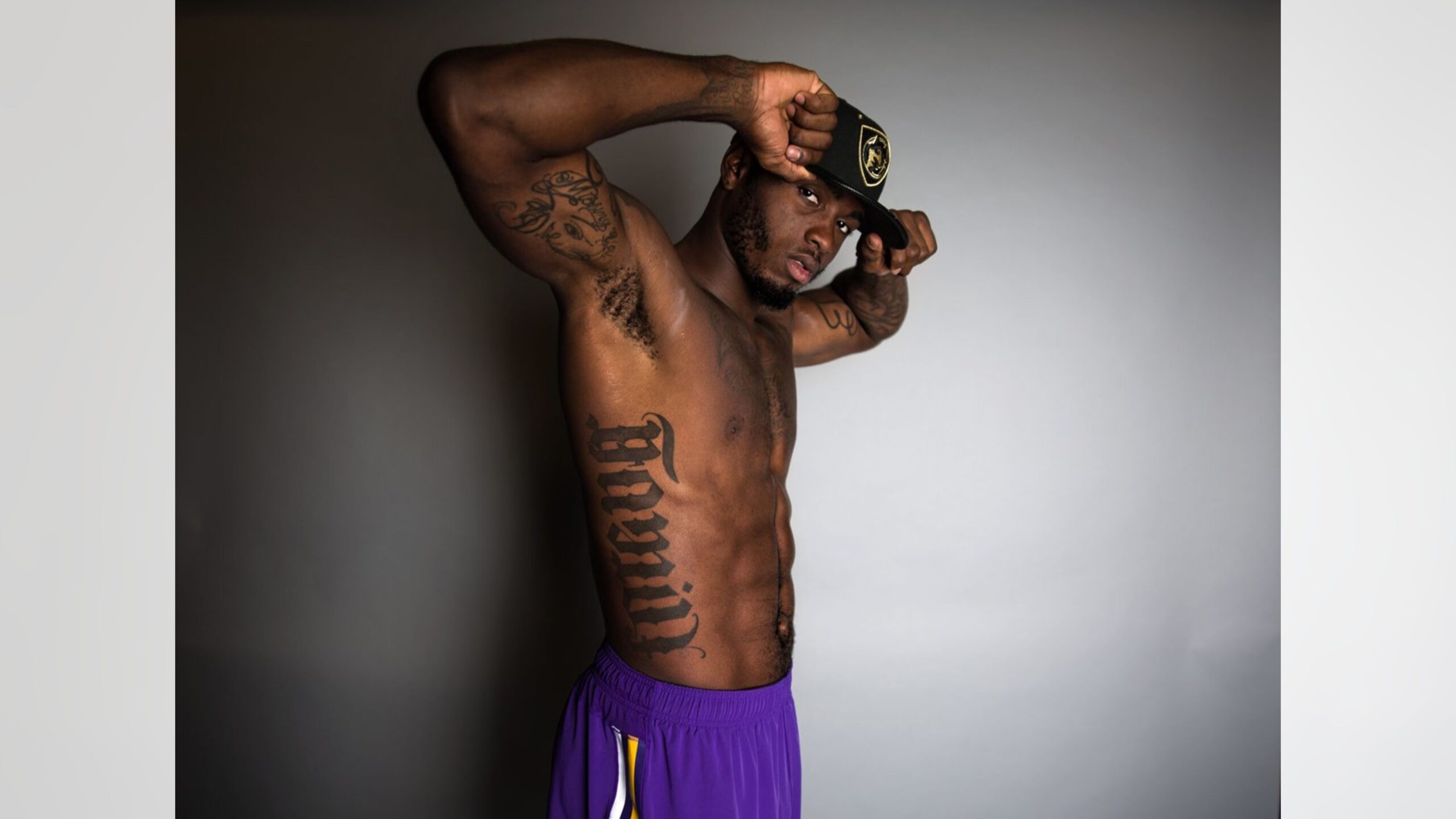 Laquon Treadwell shoulder and arm tattoo portrait Laquon Treadwell tattoos: color side portrait showing shoulder, chest and arm tattoos