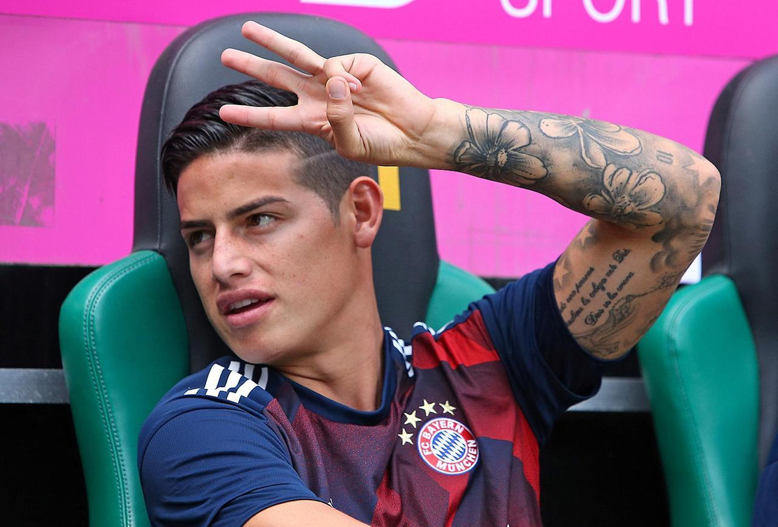 James Rodríguez tattoos: clear close-up of James Rodríguez’s flower-heavy arm sleeve