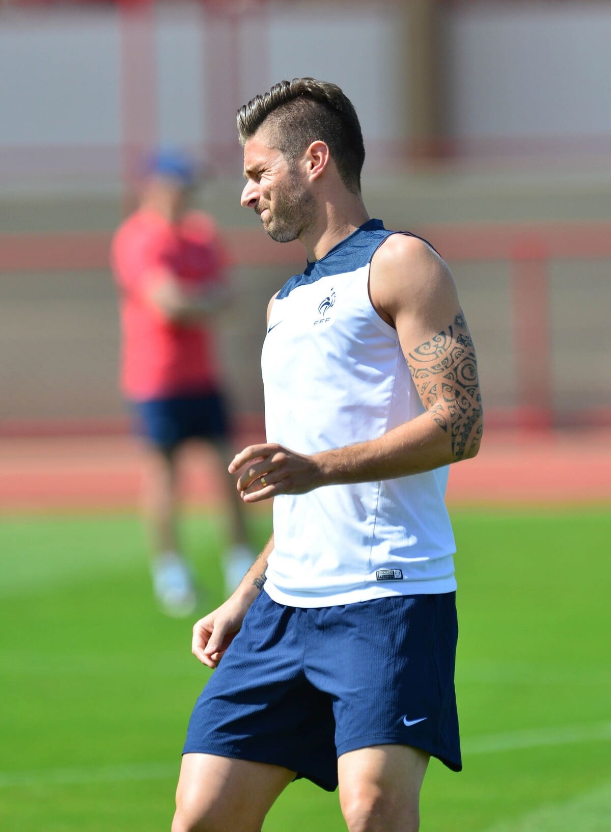 Olivier Giroud tattoos: Olivier Giroud training photograph showing the Polynesian-inspired arm tattoo