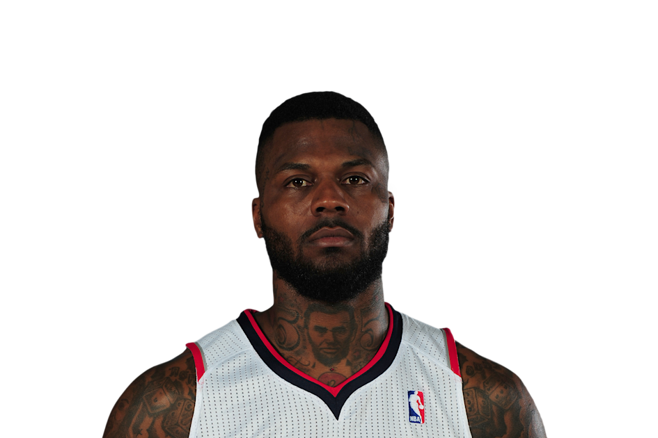 DeShawn Stevenson tattoos: clear player portrait showing his neck writing and tattooed arms