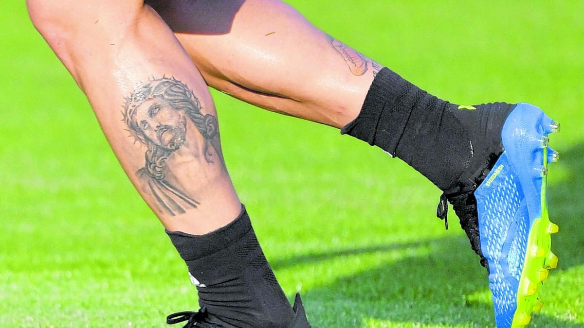 James Rodríguez tattoos: close-up of Rodríguez’s Jesus portrait tattoo on the calf