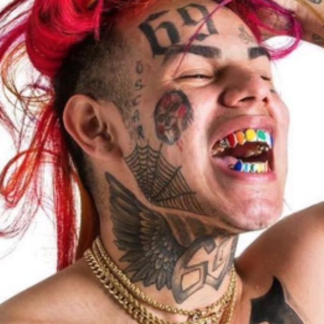 6ix9ine Jigsaw face tattoo close-up