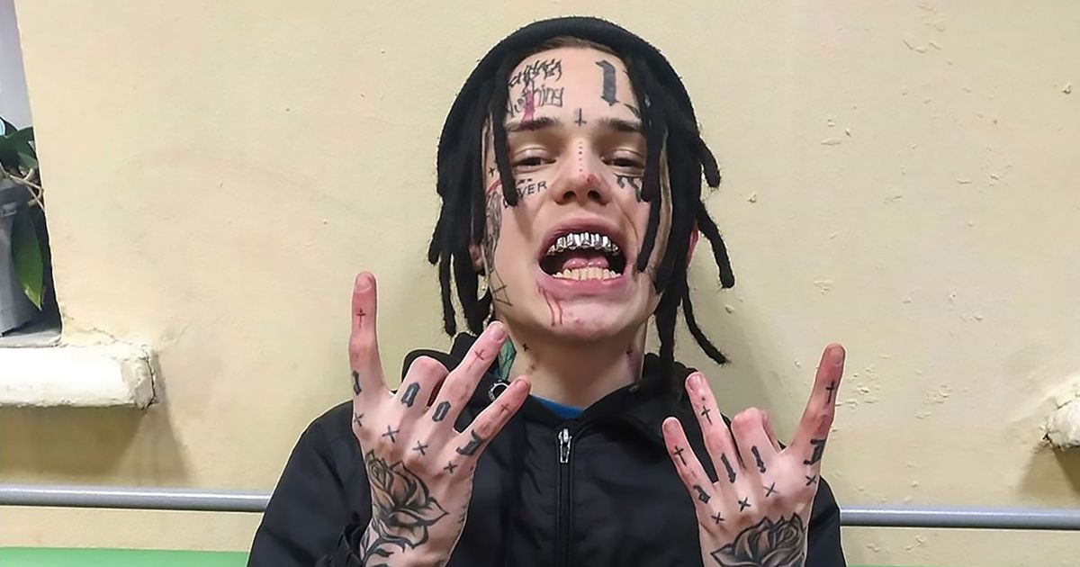 6ix9ine face and hand tattoos