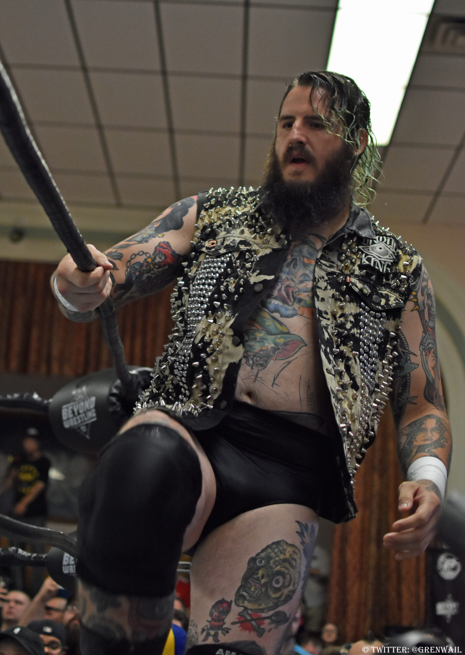 Brody King tattoos: high-resolution action photograph showing the chest panel, both sleeves and a large thigh piece without a generic portrait crop