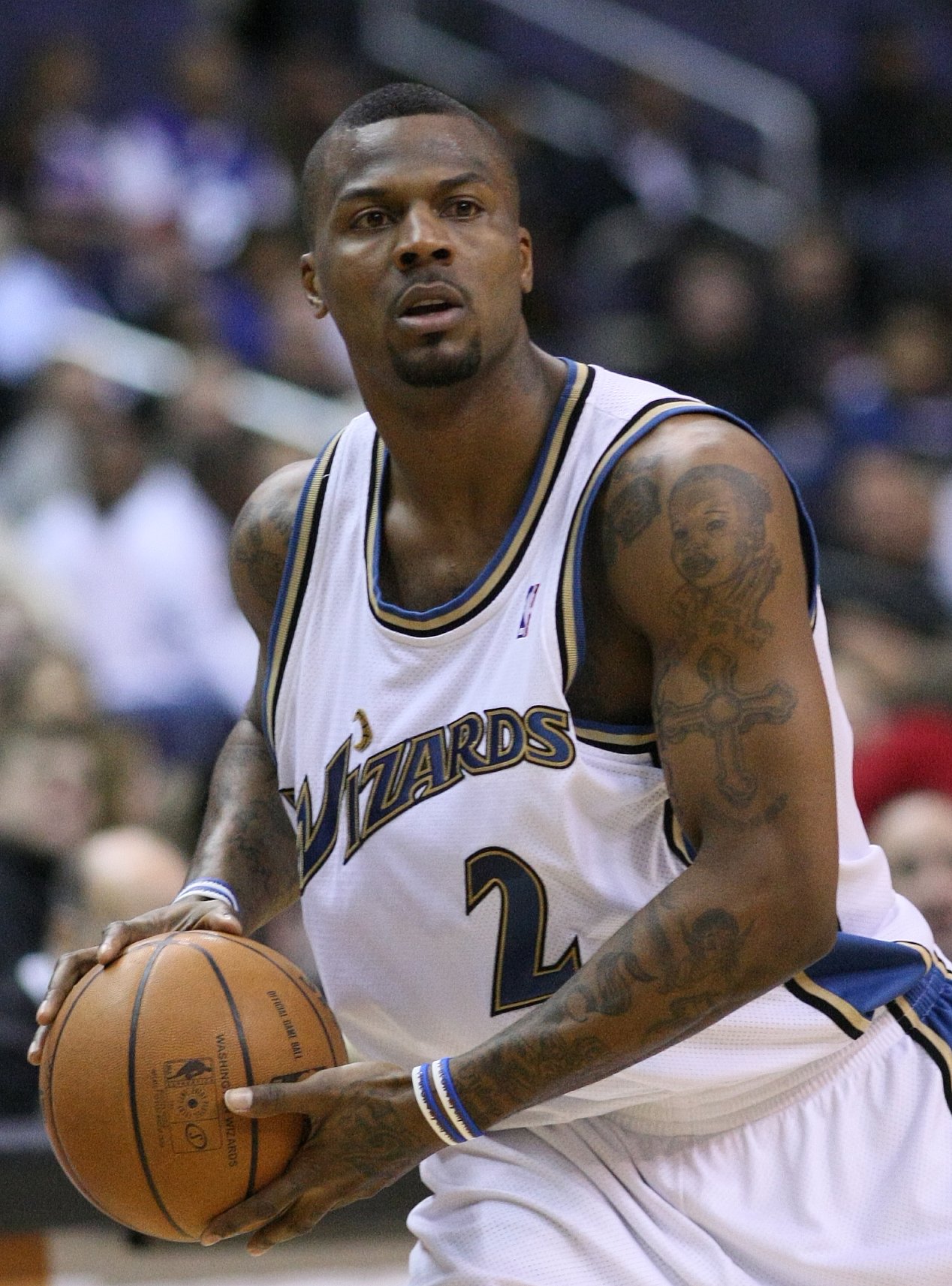 DeShawn Stevenson tattoos: high-resolution Wizards portrait with visible arm portrait and sleeve ink