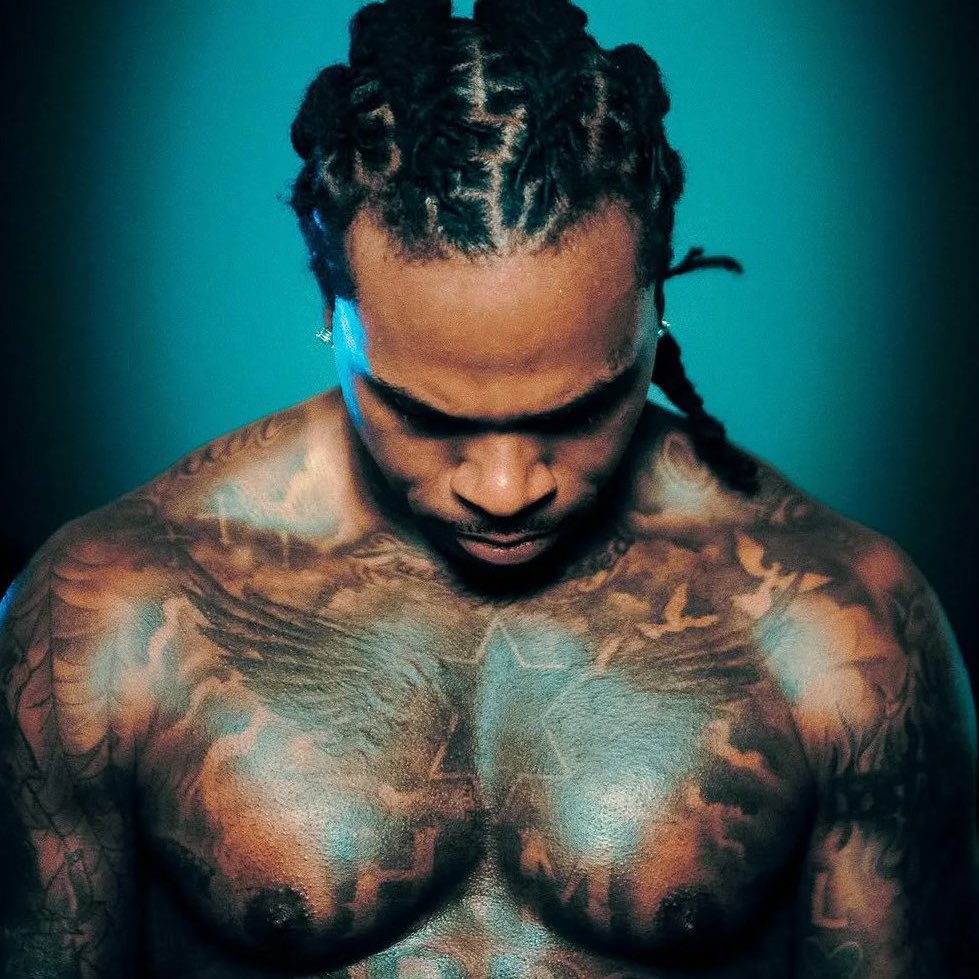 Gunna tattoos: winged chest and shoulder tattoo layout