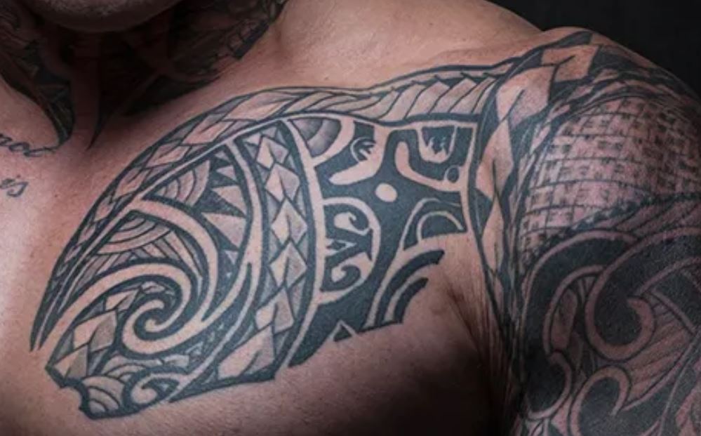 Martyn Ford left chest tribal tattoo