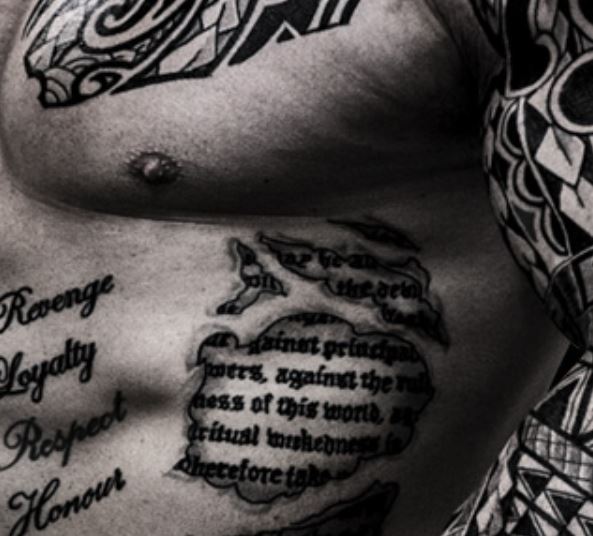 Martyn Ford stomach writing tattoo