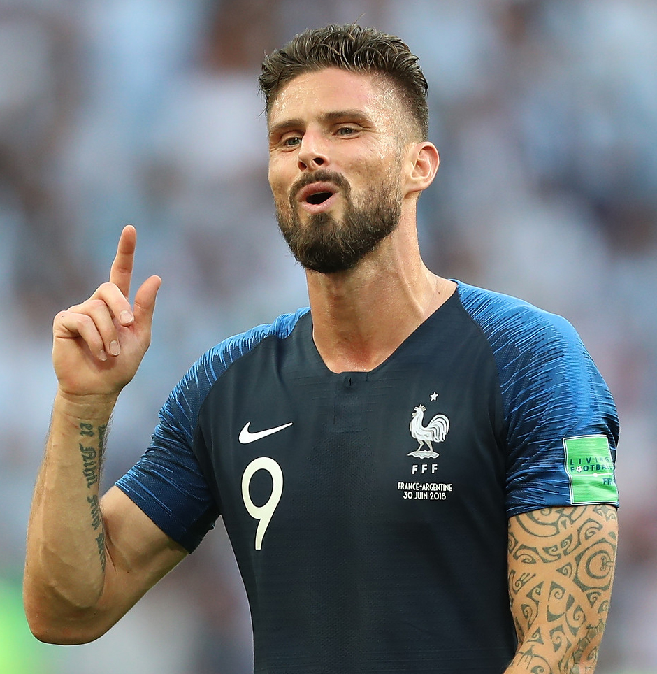 Olivier Giroud tattoos: Olivier Giroud close portrait showing the tattooed arms