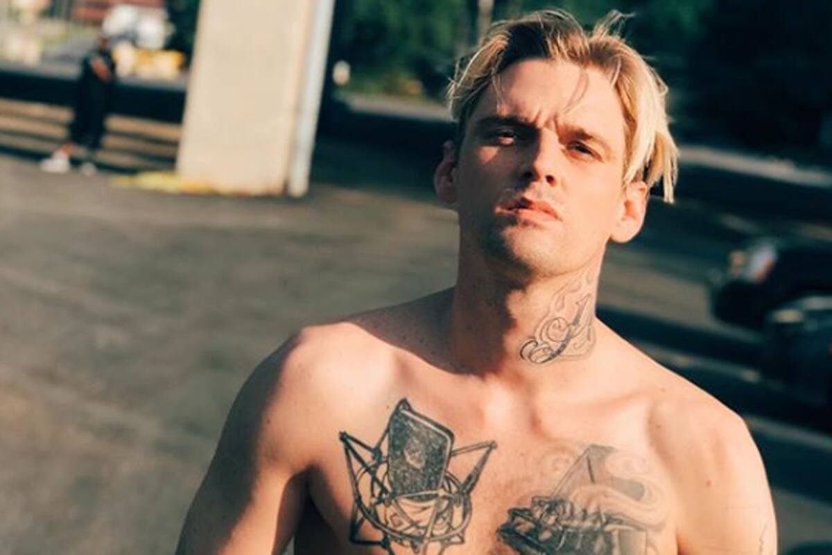 Aaron Carter face and neck tattoo view