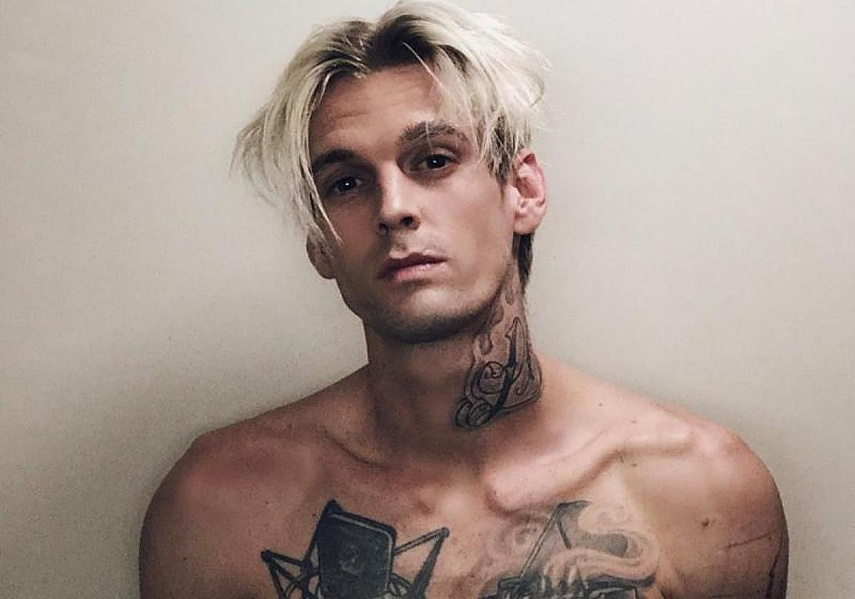 Aaron Carter LOVE neck tattoo