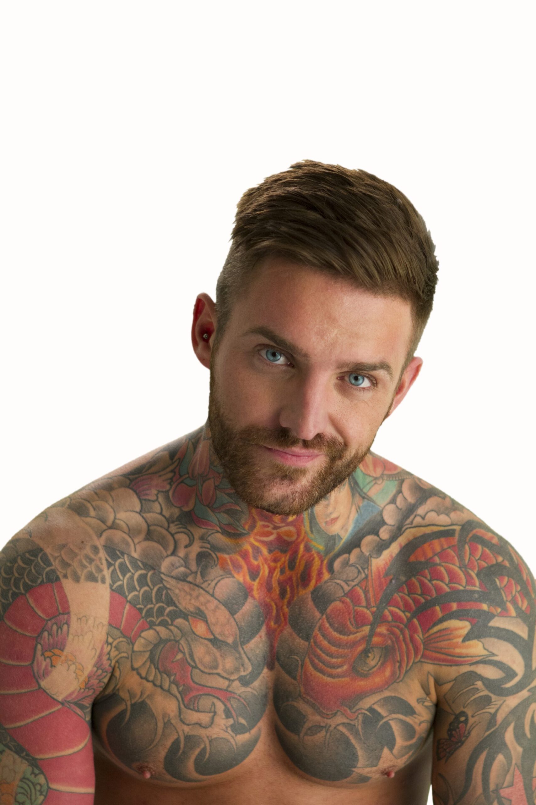 Aaron Chalmers tattoos: Aaron Chalmers's chest, shoulder and torso tattoo coverage in an MTV promotional portrait