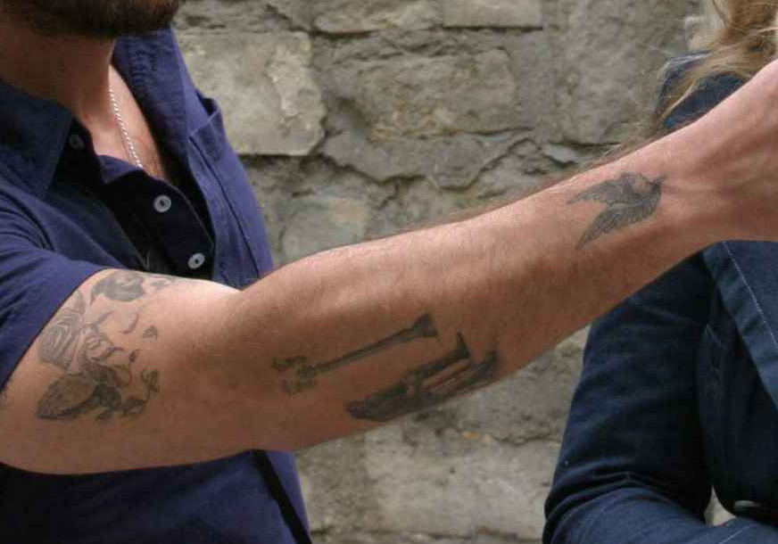 Adam Goldberg chest and arm tattoos
