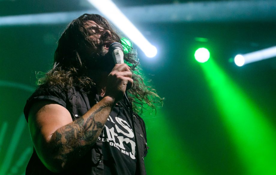 Adam Lazzara showing his music-inspired tattoos