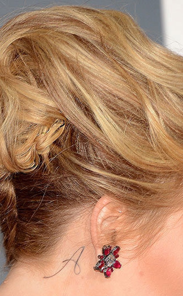 Adele A hand tattoo close-up