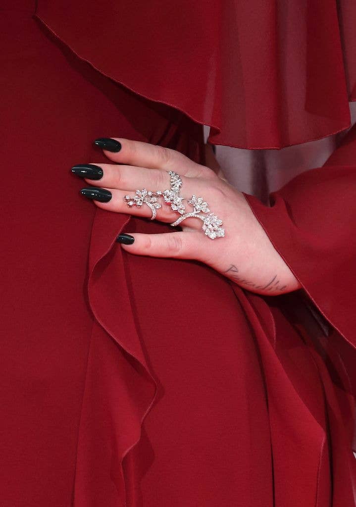 Adele hand writing tattoo