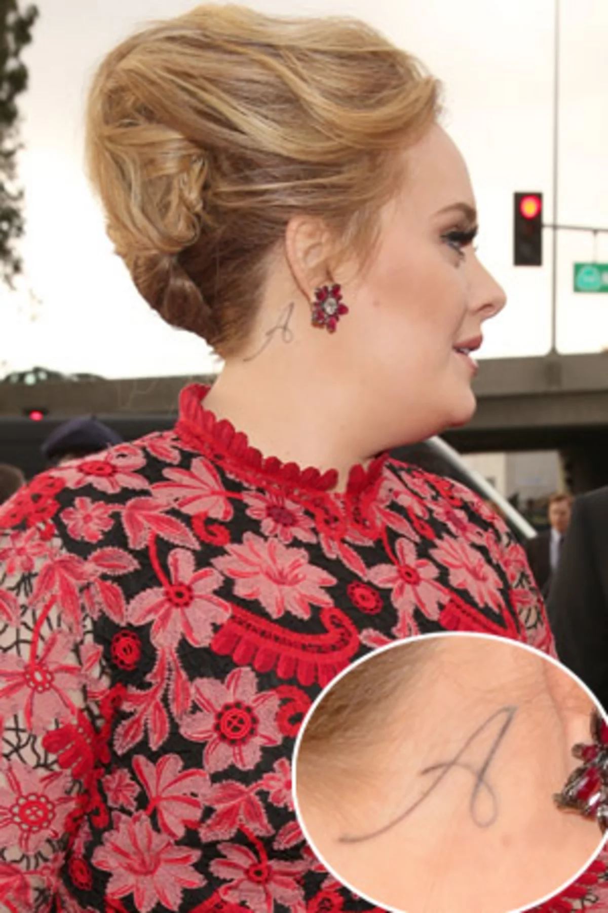 Adele A neck tattoo close-up