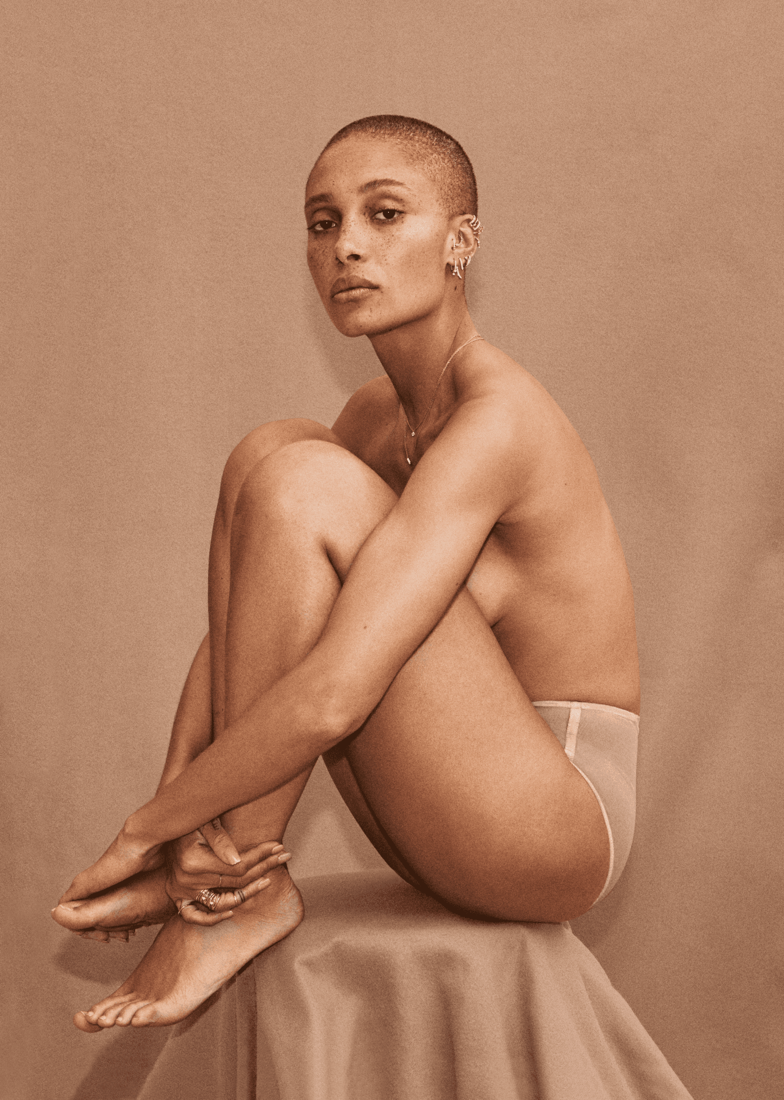 Adwoa Aboah tattoos: Adwoa Aboah wrist quote tattoo context