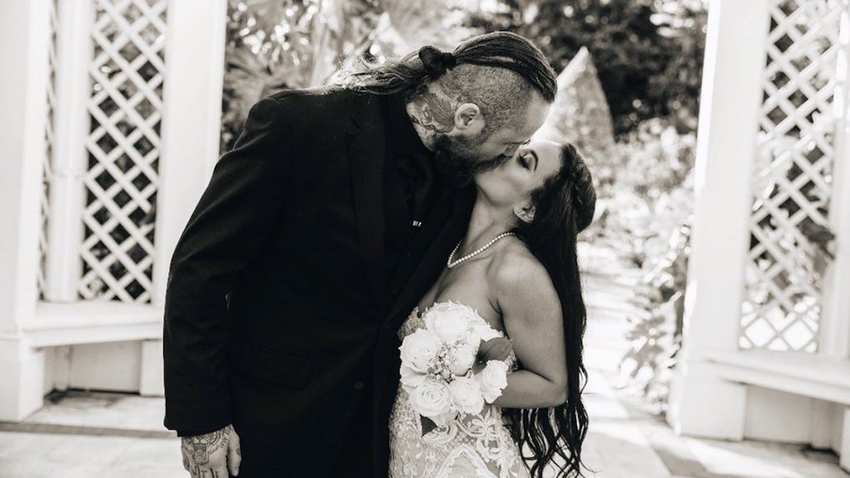 Aleister Black neck and hand tattoos at his wedding
