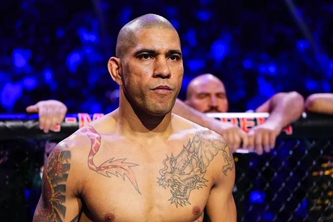 Alex Pereira chest and shoulder tattoos under arena lights