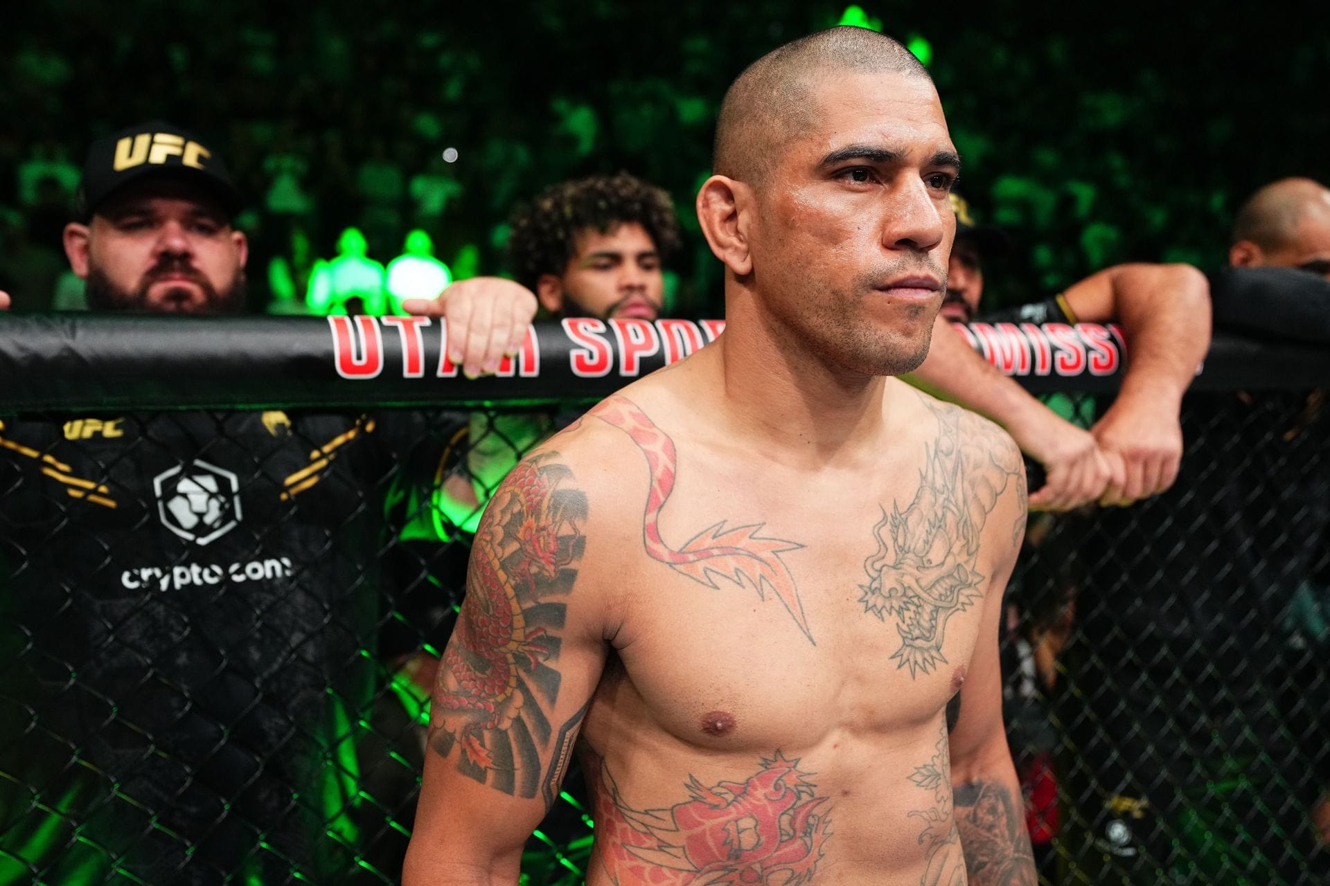 Alex Pereira dragon chest and sleeve tattoos in the octagon