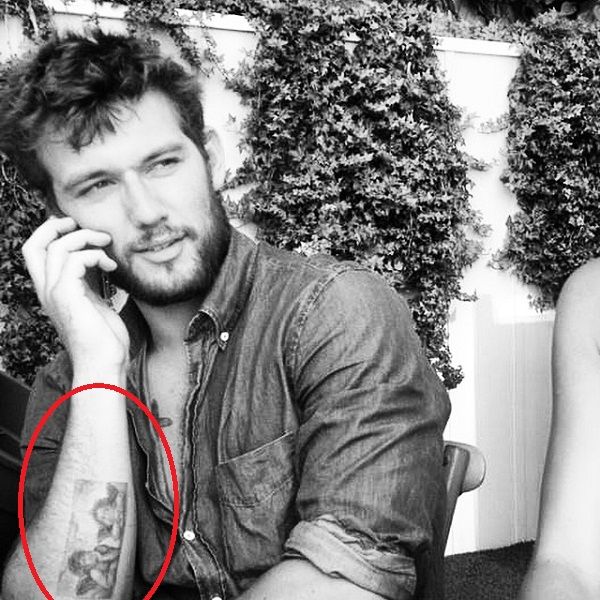 Alex Pettyfer arm portrait tattoo