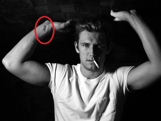 Alex Pettyfer linked hearts ER tattoo
