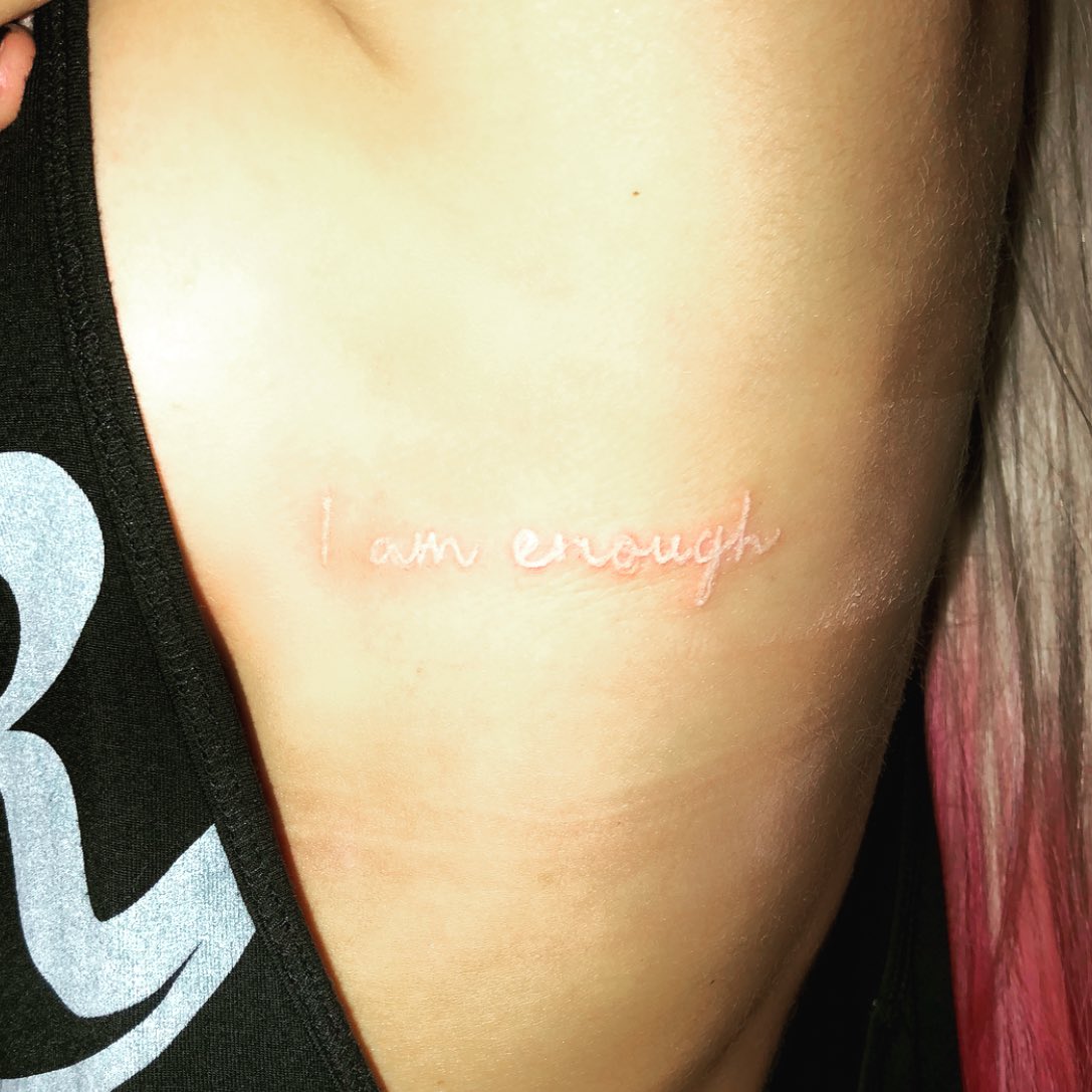 Alexa Bliss white ink I am enough side tattoo