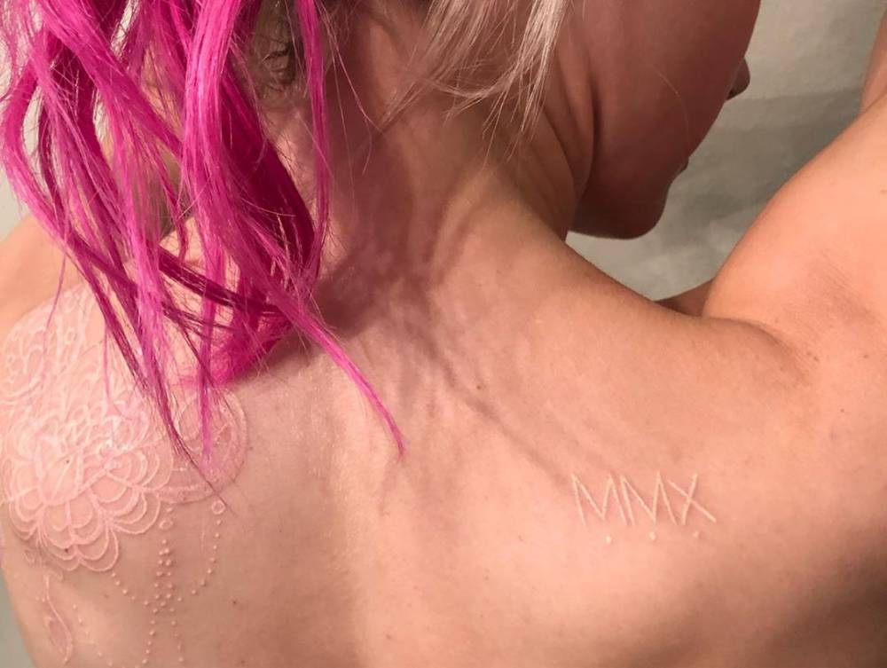 Alexa Bliss white ink MMXX shoulder tattoo