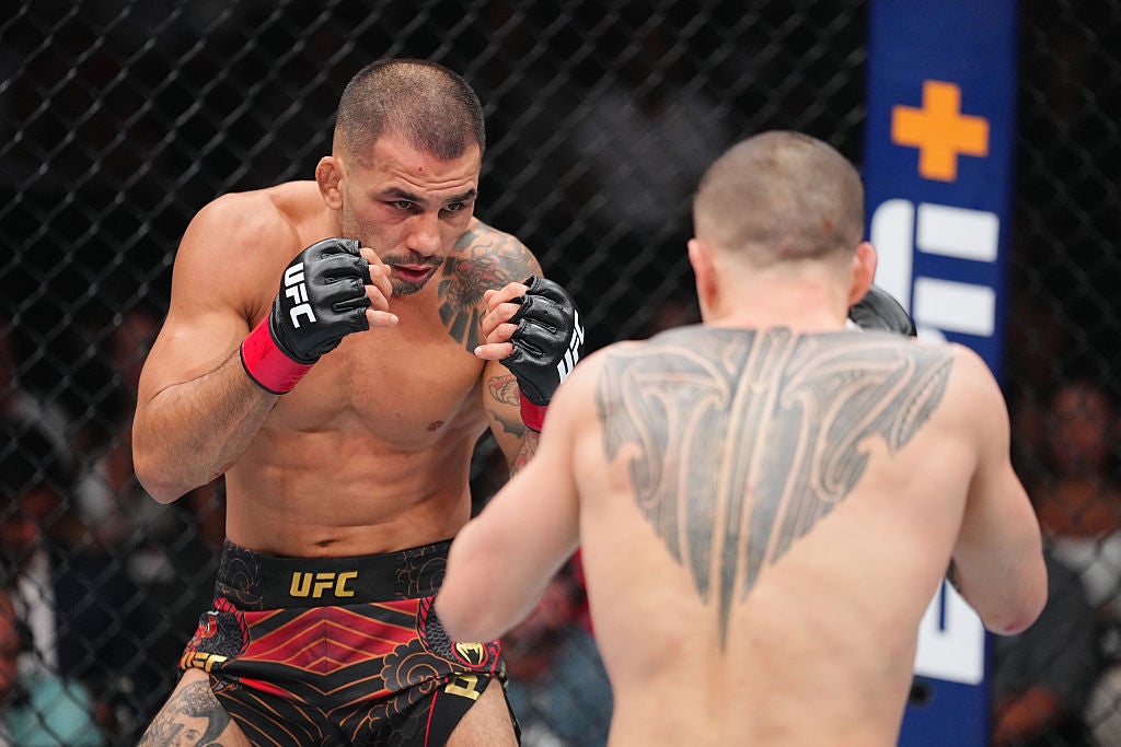 Alexandre Pantoja in a contextual photograph: Competition context at UFC 317; not tattoo evidence