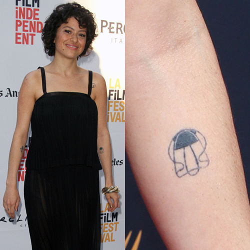 Alia Shawkat tattoos: genuine tattoo photograph showing Shawkat's loose abstract forearm doodle