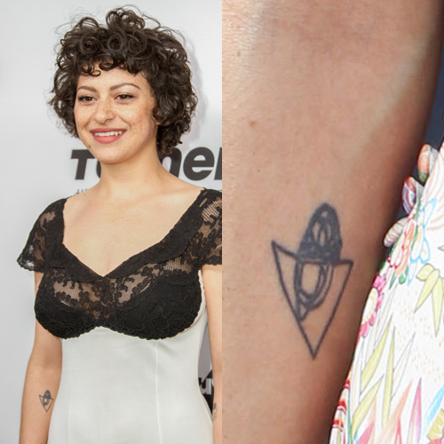Alia Shawkat tattoos: genuine tattoo photograph showing Shawkat's triangle and rounded-form forearm doodle