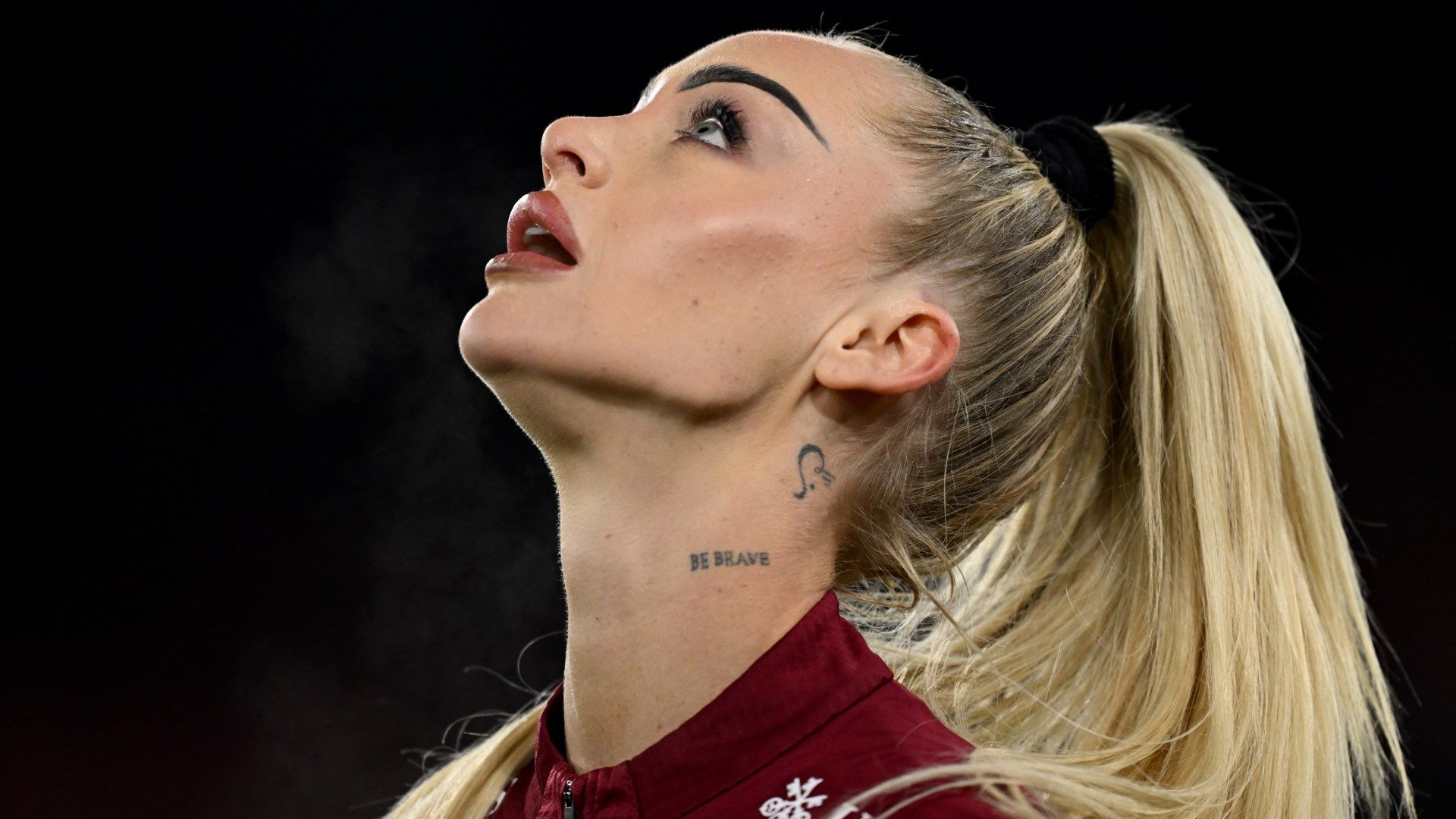 Alisha Lehmann tattoos: Alisha Lehmann's small neck symbol and visible arm tattoos