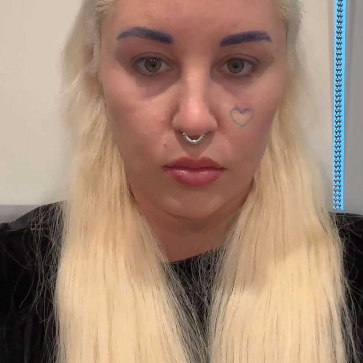 Amanda Bynes tattoos: A close view of the cheek heart