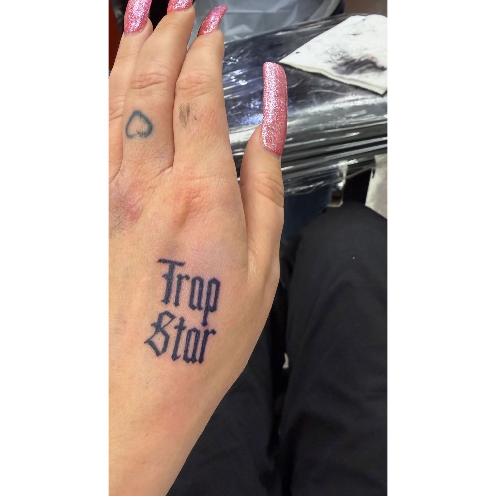 Amanda Bynes tattoos: A detail view of the blackletter hand tattoo